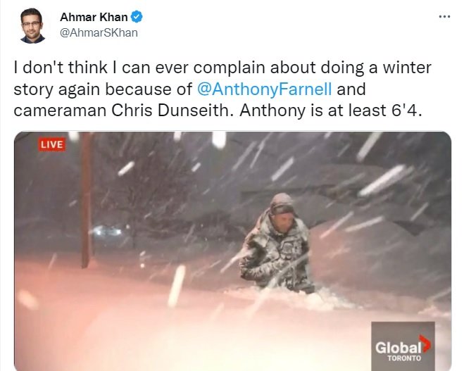 Anthony Farnell of the Weather Channel wades through 6-feet of snow in Buffalo, NY