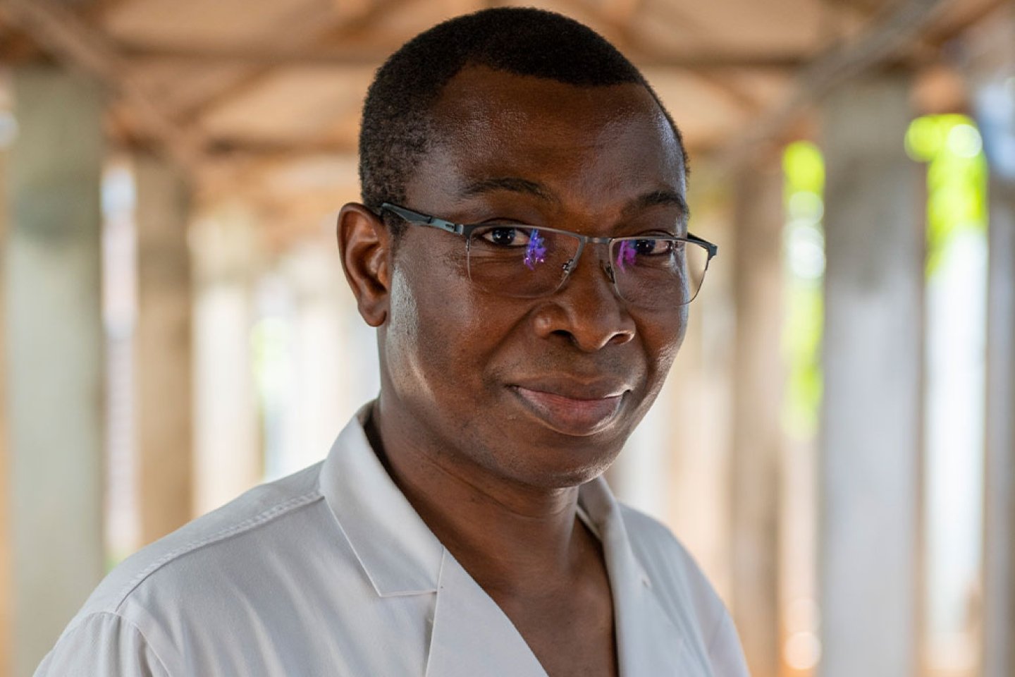 Closeup of Dr. GrÃ©goire Akakpo-Numado smiling.