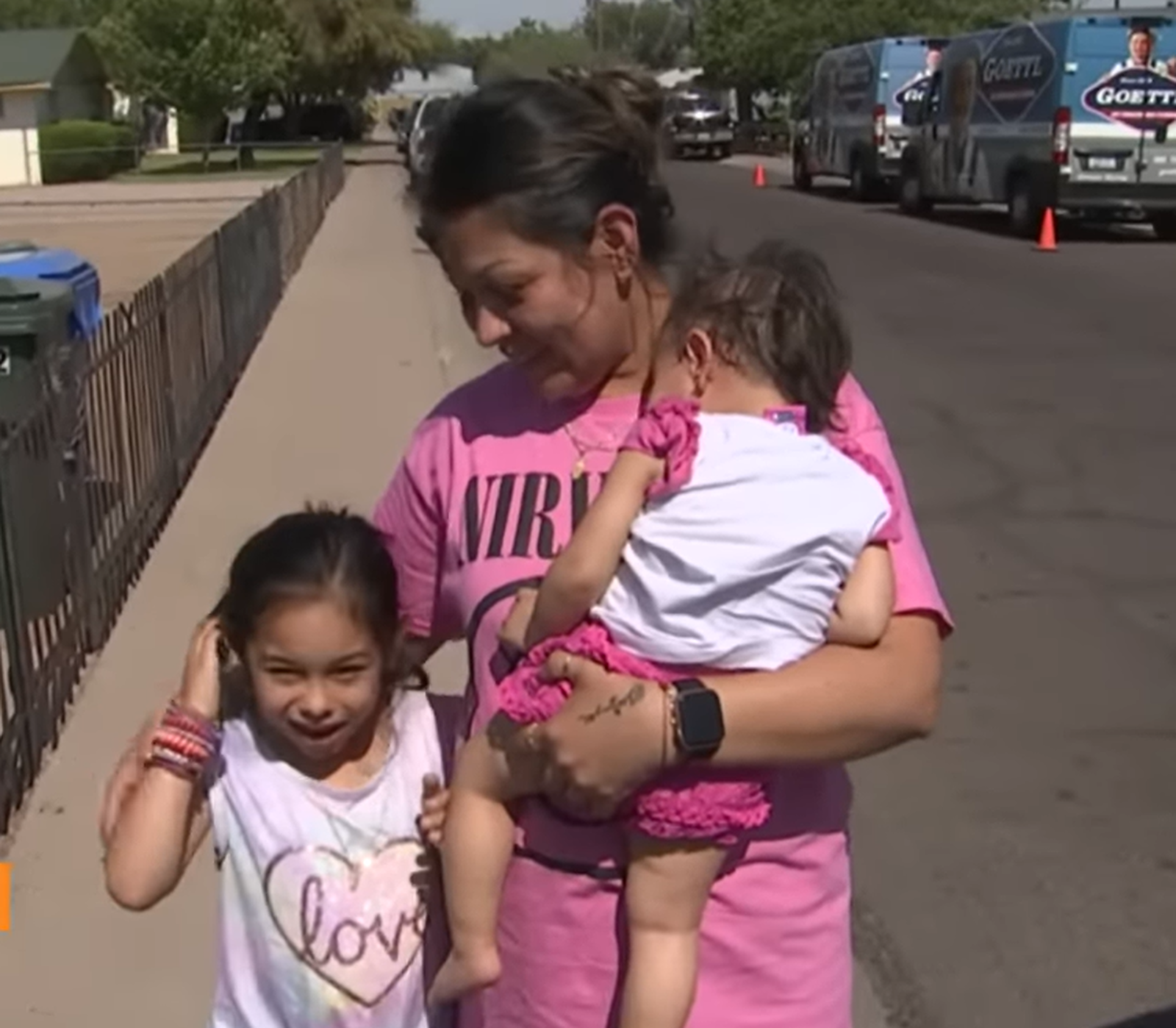 Claudia Jimenez with her two daughters in Phoenix, Arizona.